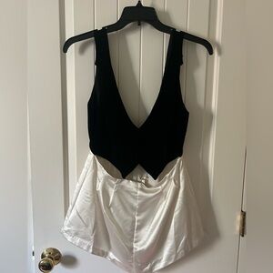 Never worn before for love and lemons romper - size medium - tags still on